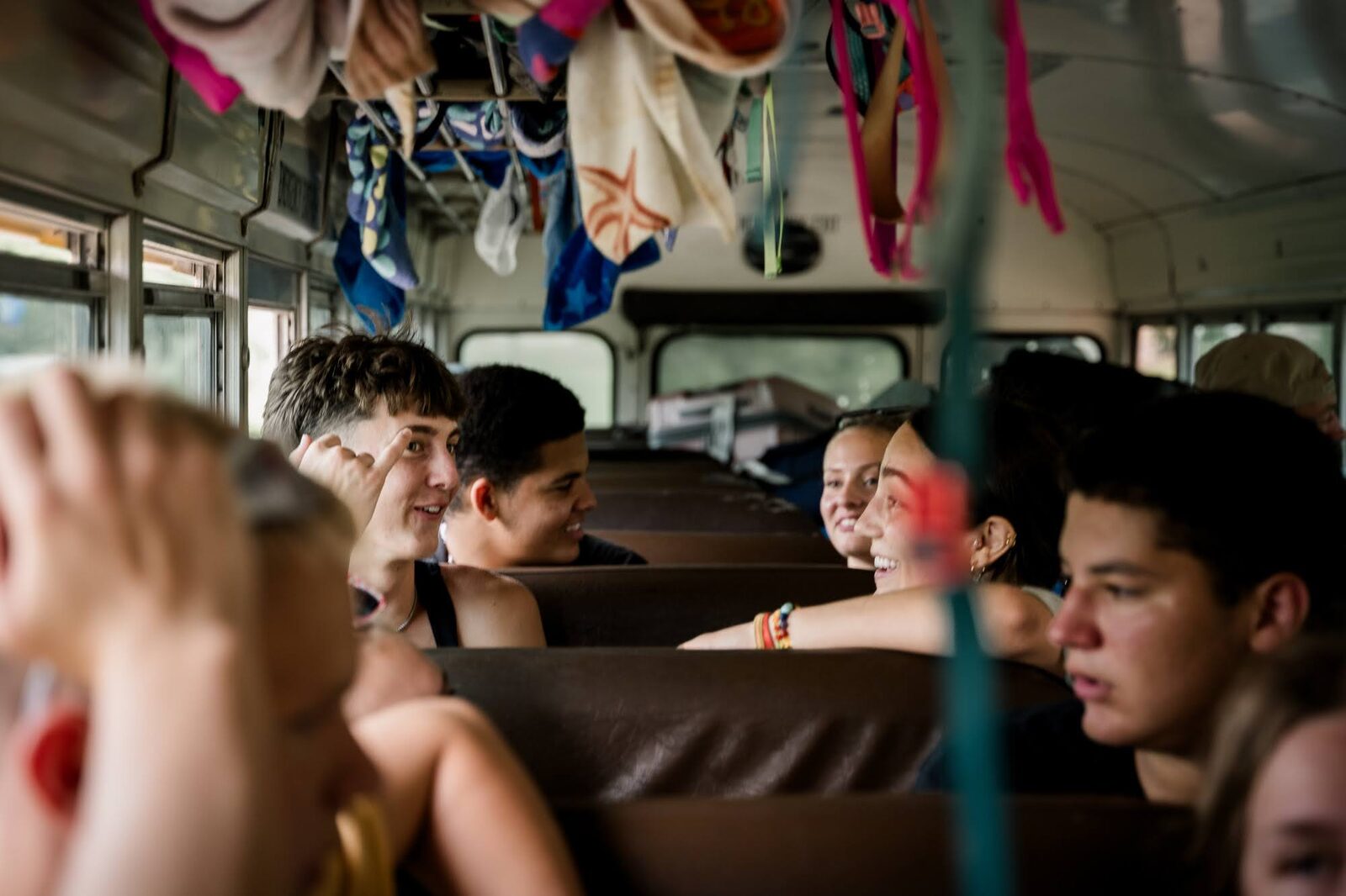 Builders laughing on the bus